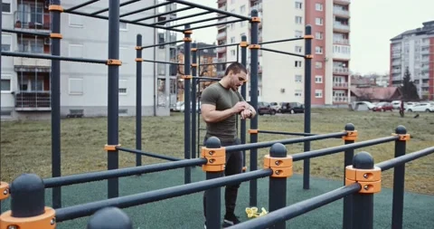 Young athlete warming up for a training , outdoor fitness Stock Footage 145347919