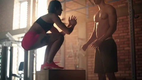 Young athletes jumping on platforms  Stock-Footage 74459334