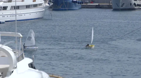 Young athletes train on yachts. Stock Footage 67826129