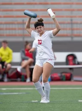 Young Athletic Girls Making Great Plays During a Soccer Game Stock Photos