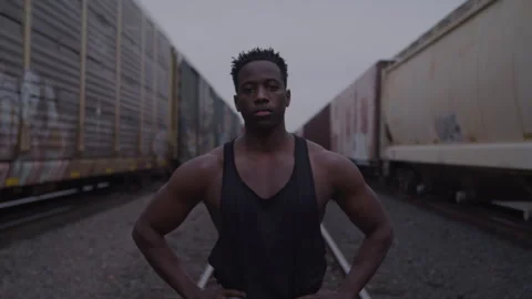 Young Athletic Guy Rests In Train Yard Stock-Footage 270327134