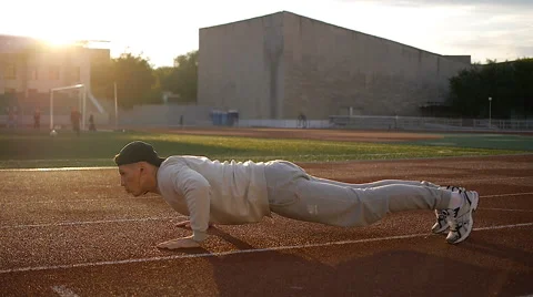Young athletic man doing warm-up before exercise and jogging 스톡 동영상 64020246