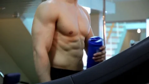 Young athletic man execute  muscle exercises Stock Footage 74113917