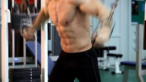 Young athletic man execute  muscle exercises Stock Footage 74113925