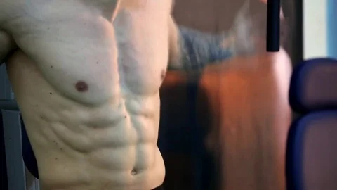 Young athletic man execute  muscle exercises Stock Footage 74113927