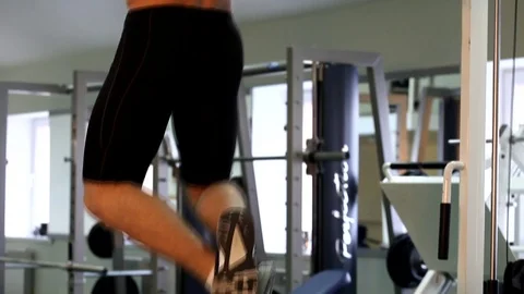 Young athletic man execute  muscle exercises Stock Footage 74405005
