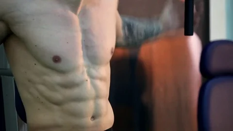 Young athletic man execute  muscle exercises Stock Footage 74405006