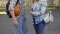 Young athletic man flirting with smart girl near university, students, meeting 4k or 4k+ Resolution