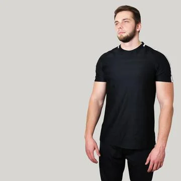 Young athletic man posing over isolated background Stock Photos