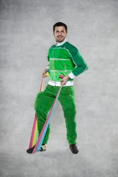 Young athletic man practicing with rubber Stock Photos