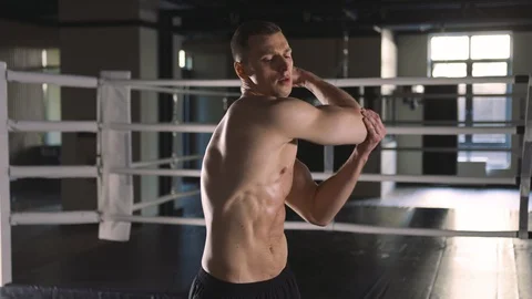 Young athletic man warming up before training Stock Footage 89592841