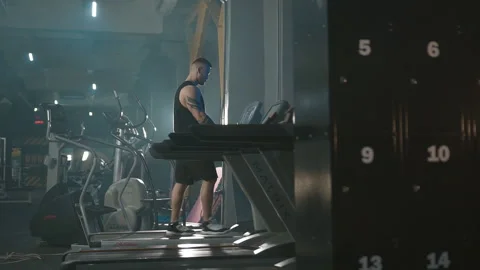 Young Athletic Men Walking On Treadmill In Sport Gym Video stock 150510184