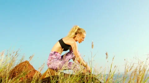Young Athletic Woman Working out in Nature. Tying Shoes. Beautiful Mountain Stock Footage 59022070