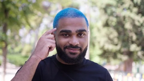 Young attractive african american man blue hair having 스톡 동영상 287491253