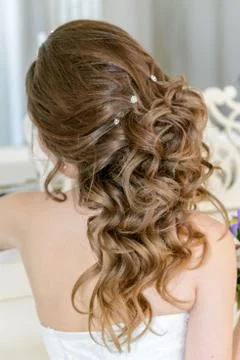Young attractive bride on wedding gown in studio Stock Photos