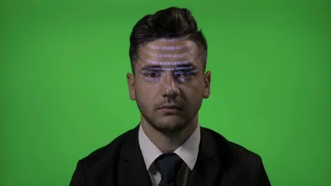 Young attractive businessman with code on face working as a computer programm Stock Footage 86425650