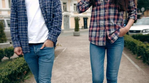 Young attractive couple walking together in the city while on vacation during a Stock Footage 63175804
