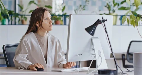Young Attractive Female Working on a Computer. Stock Footage 127313690