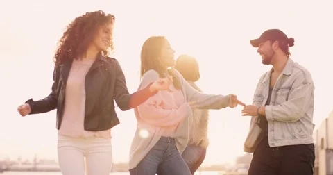 Young attractive group dancing together at sunset Stock Footage 85124192