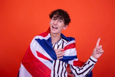 Young attractive guy with a flag. Stock Photos