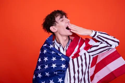 Young attractive guy with a flag. Stock Photos