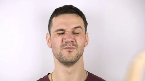 A young attractive guy gets a slap in the face from his girlfriend. Slow motion Stock Footage 161883991