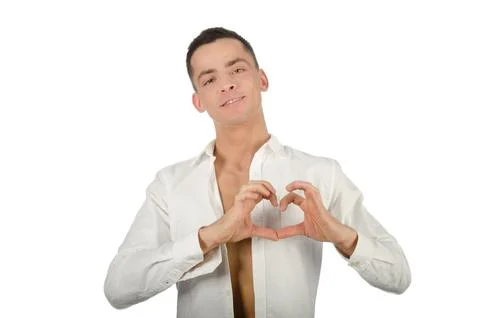Young attractive guy posing in the studio. Beautiful body. Stock Photos