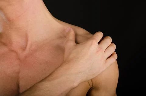 Young attractive guy posing in the studio. Beautiful body. Foto stock