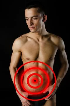 Young attractive guy posing in the studio. Beautiful body. Foto stock