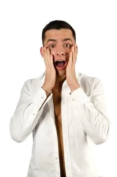 Young attractive guy posing in the studio. Beautiful body. Stock Photos