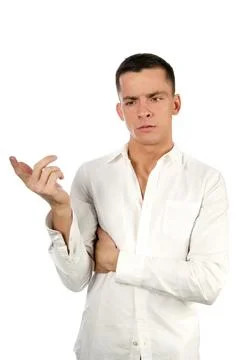 Young attractive guy posing in the studio. Beautiful body. Stock Photos