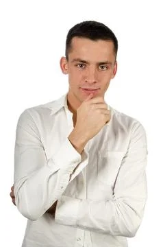 Young attractive guy posing in the studio. Beautiful body. Stock Photos
