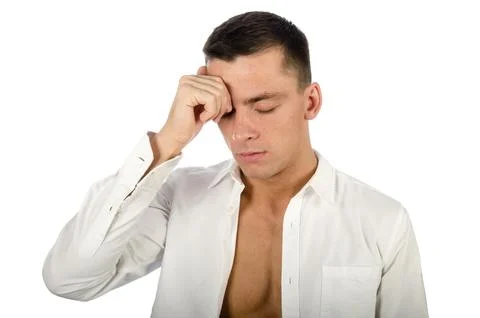 Young attractive guy posing in the studio. Beautiful body. Stock Photos
