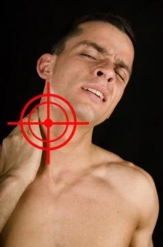 Young attractive guy posing in the studio. Beautiful body. Stock Photos