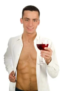 Young attractive guy posing in the studio. Beautiful body. Stock Photos
