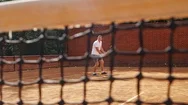 Young Attractive Man Playing Tennis On Orange Clay Tennis Court Stock Footage