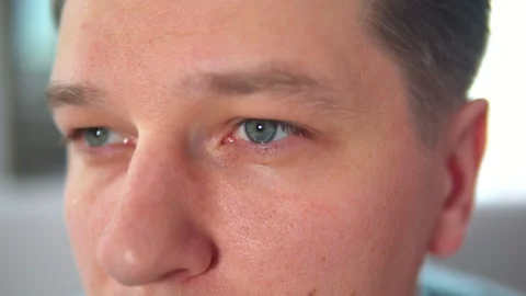 Young attractive man's face close up Stock Footage 107849401