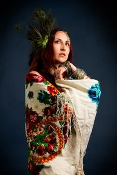 Young attractive retro model in old-fashioned wild clothing dancing Stock Photos