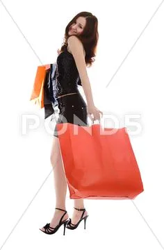 Young attractive woman with bags Stock Photos