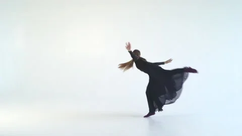 Young attractive woman dancing a dramatic dance on a white background. Contour Stock Footage 86233047