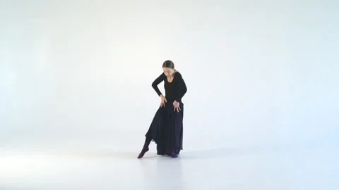 Young attractive woman dancing a dramatic dance on a white background. Contour Stock Footage 86234081
