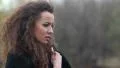 Young attractive woman feeling cold and lonely in autumn park HD Footage