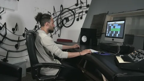 Young audio engineer in recording studio. Stock Footage 113191029