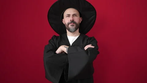 Young bald man wearing wizard costume standing with arms crossed gesture ov.. Stock Footage 233397146