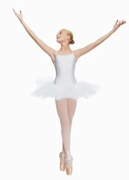 Young ballerina (14-15) standing on pointe in toe shoes,, portrait Stock Photos
