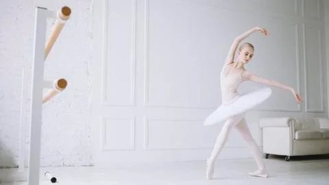 Young ballerina in ballet class Stock Photos