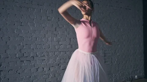 Young ballerina dancing in the hall Stock Footage 113895599