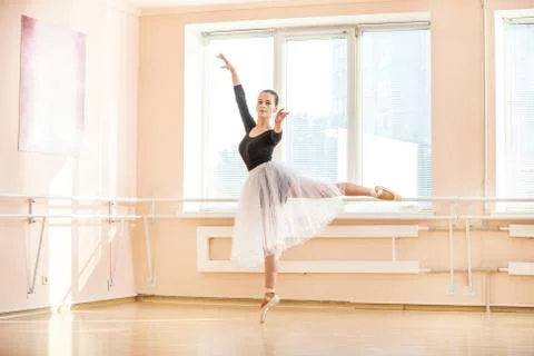 Young ballerina dancing on pointe Stock Photos