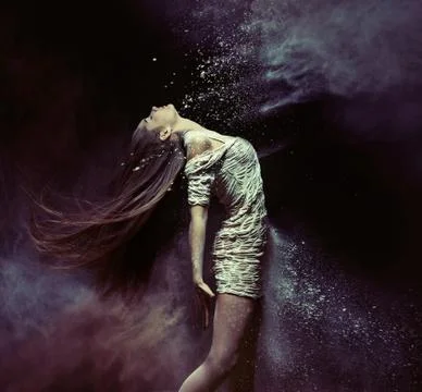 Young ballet dancer dancing with the dust Stock Photos