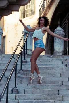 Young ballet dancer posing in the urban scenery of the city in Lisbon, Portug Stock Photos